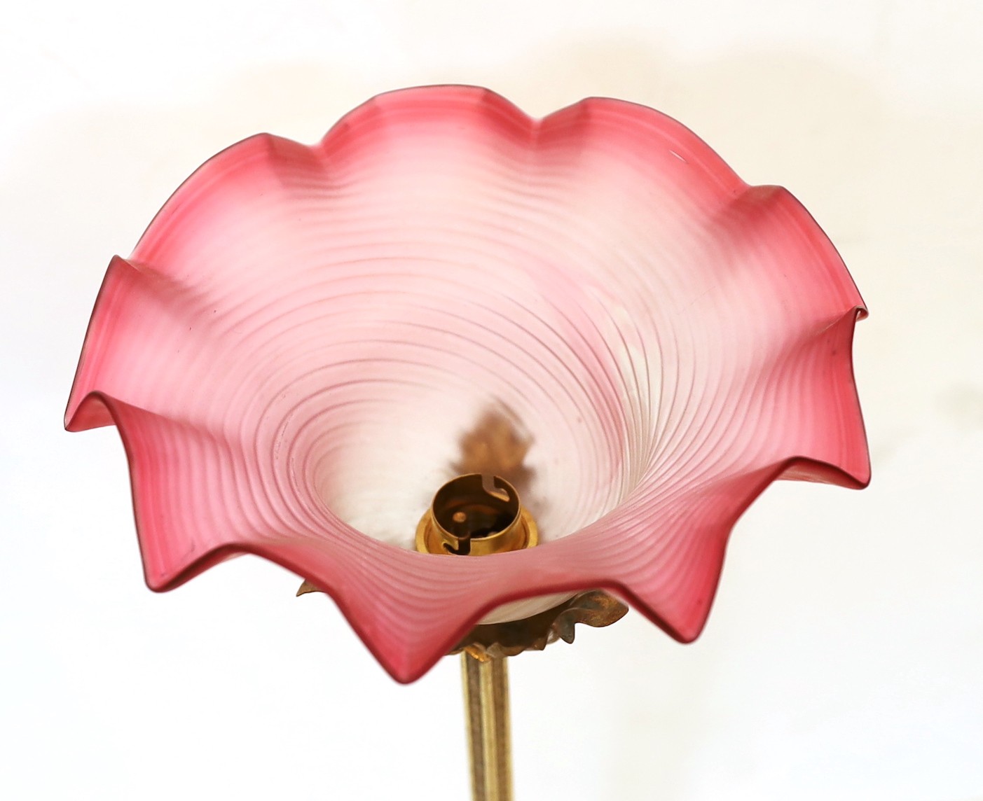 An early 20th century English lacquered brass table lamp with tinted and frosted glass shade, height 46cm